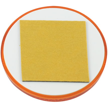 Rückstrahler 60 mm orange selbstklebend mit Befestigungsloch